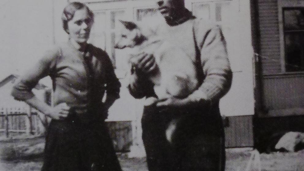 John Ekman with wife Serafina and dog Bella in the garden of Kirkkokatu 65.